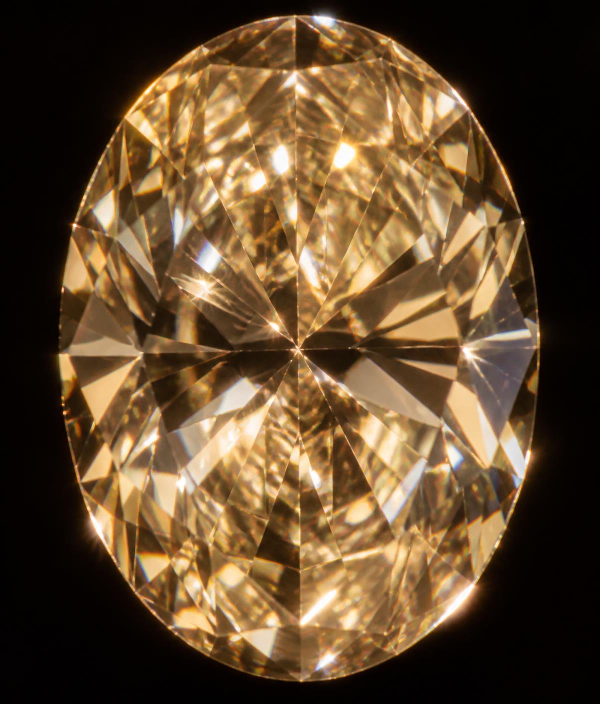 Macro view of faceting and brilliance in a rare oval-cut gemstone